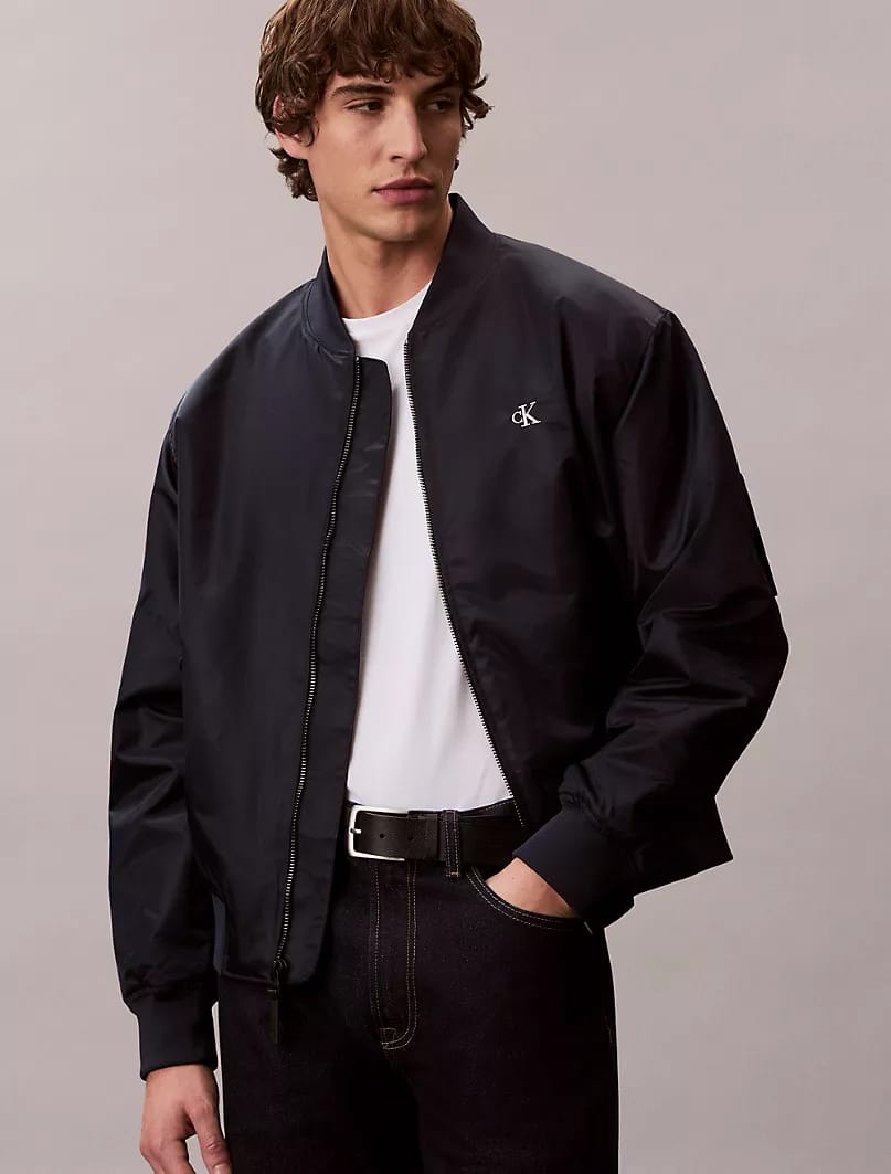 This is a Calvin Klein Nylon Bomber Jacket in navy blue_ Navy