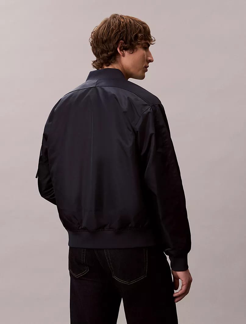 This is a Calvin Klein Nylon Bomber Jacket in navy blue_ Navy