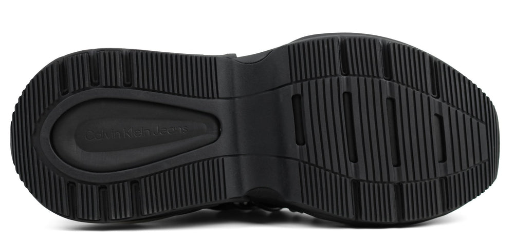 This is a Calvin Klein Chunky Comfair Low LTH MR sneaker in black and white.