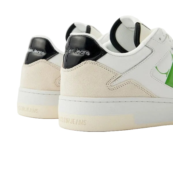 This is a pair of Calvin Klein low cupsole suede trainers in off white and green with a gum sole.