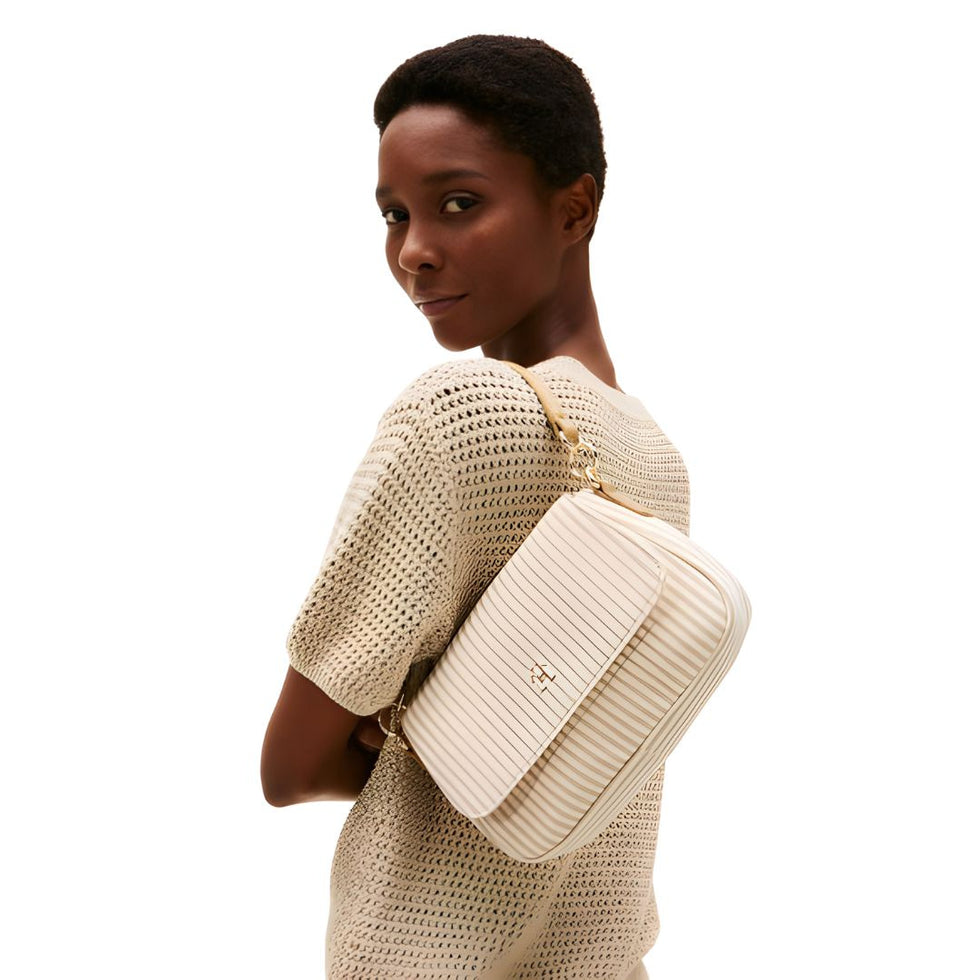Tommy Hilfiger Poppy Canvas Stripe Convertible Crossbody Bag in light tan/beige.