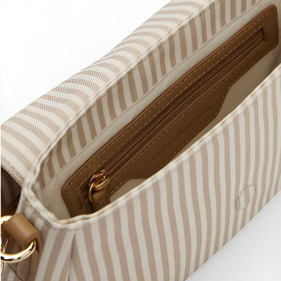 Tommy Hilfiger Poppy Canvas Stripe Convertible Crossbody Bag in light tan/beige.