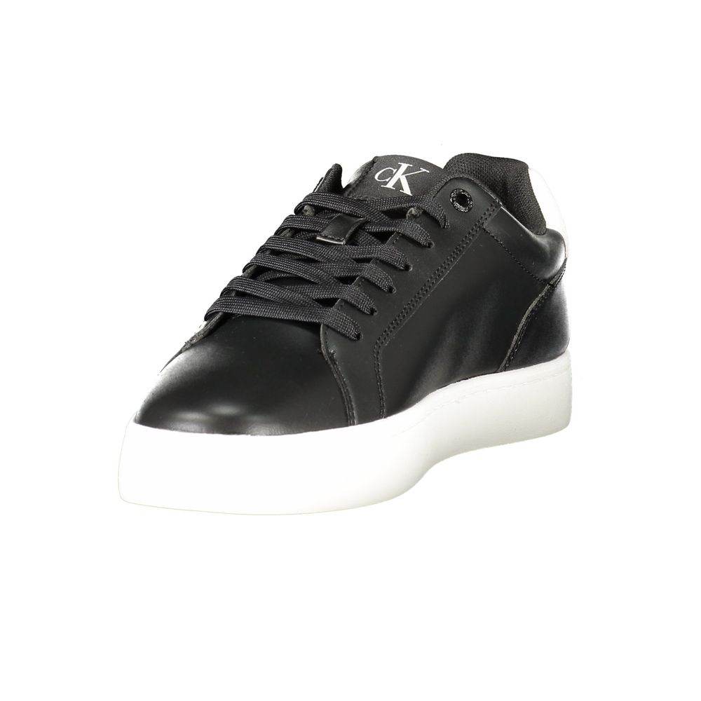 This is a pair of Calvin Klein Classic Cupsole Mono leather sneakers in black and white.