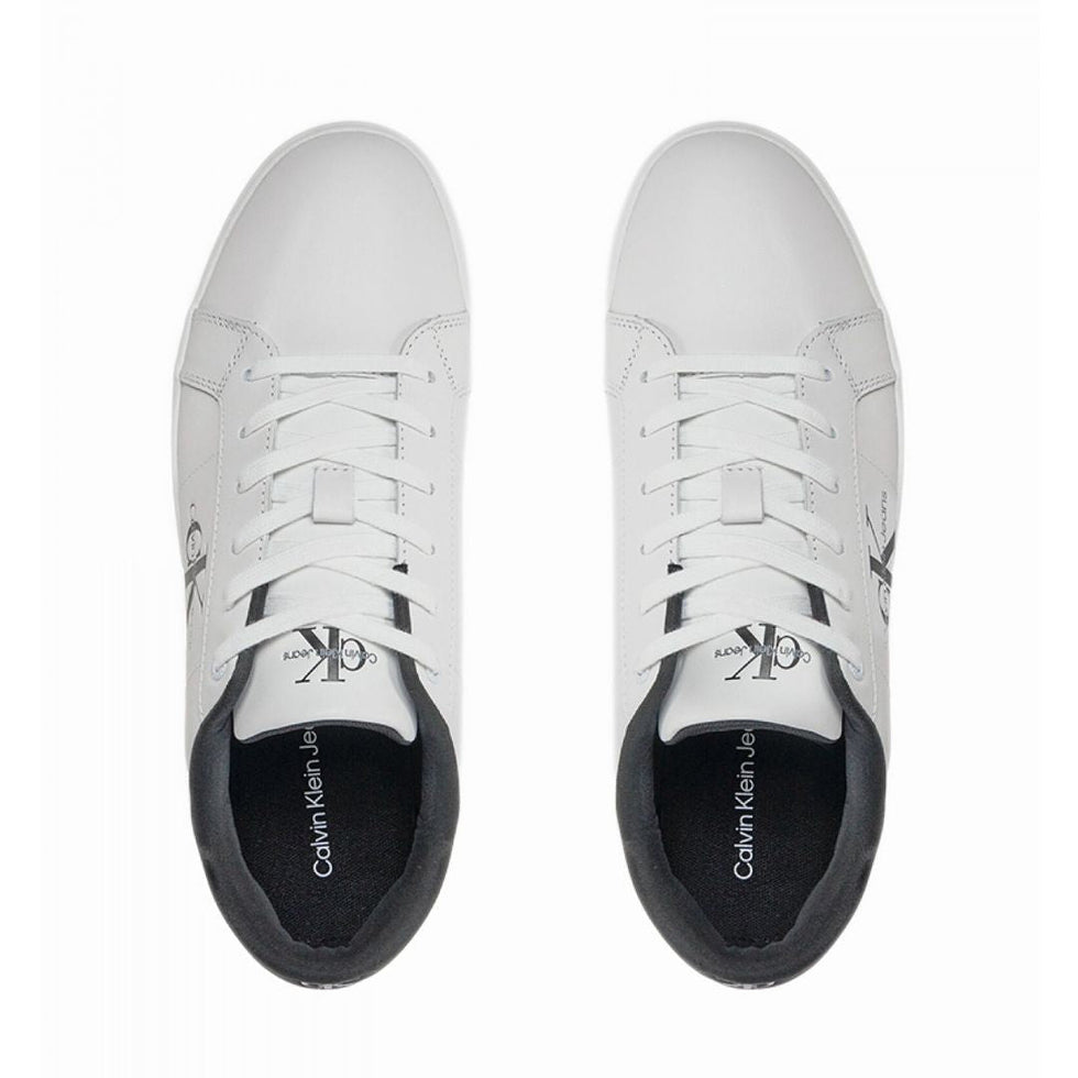 Calvin Klein Jeans Classic Cupsole low-top leather sneakers in white and black.
