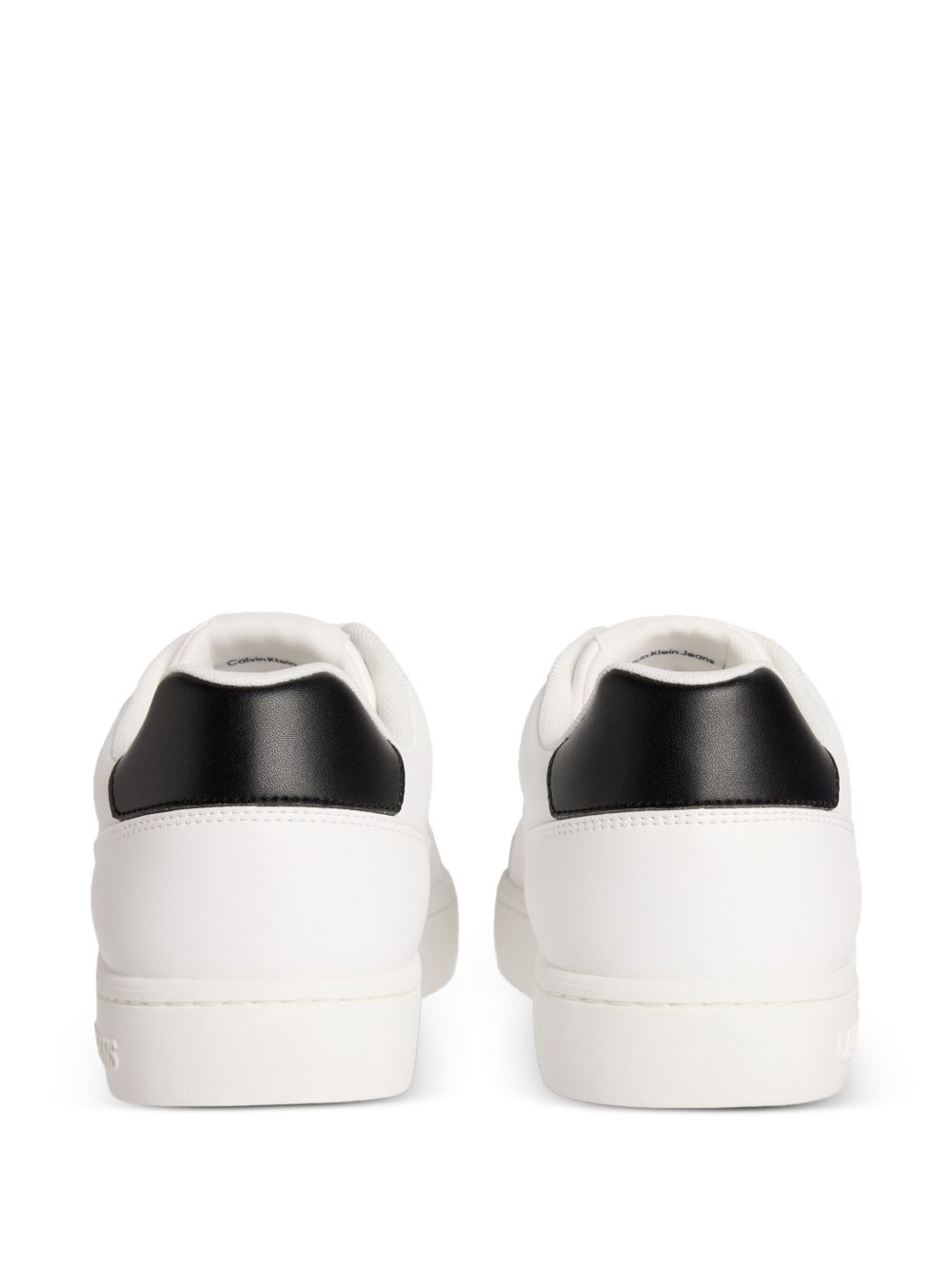 Calvin Klein Jeans Classic Cupsole low-top leather sneakers with a black heel tab and logo details. _ White
