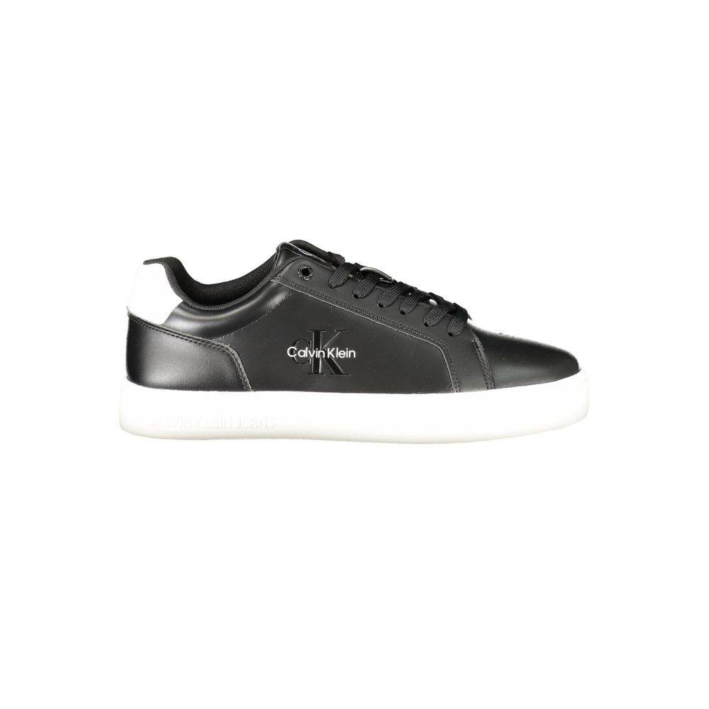 This is a pair of Calvin Klein Classic Cupsole Mono leather sneakers in black and white.
