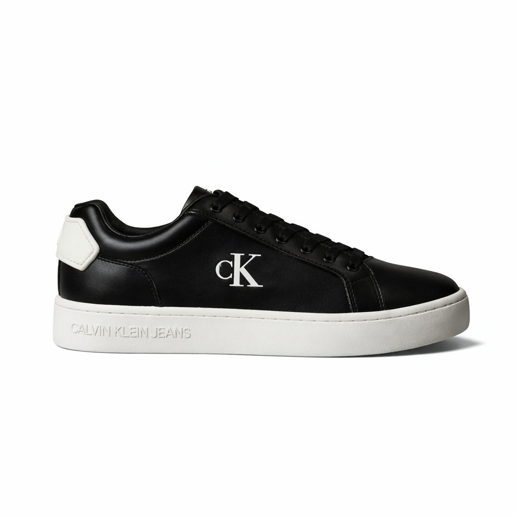 This is a pair of Calvin Klein Classic Cupsole Patch Leather sneakers in black and white.