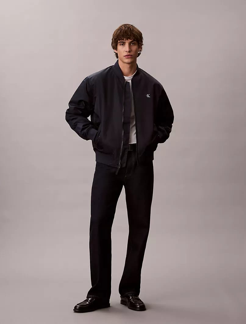 This is a Calvin Klein Nylon Bomber Jacket in navy blue_ Navy