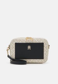 Tommy Hilfiger Women’s Beige & Black Crossbody Bag – Compact Elegance
