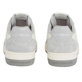 This is a pair of Calvin Klein Jeans Basket Cupsole Low sneakers in white and grey suede with red logo detail.