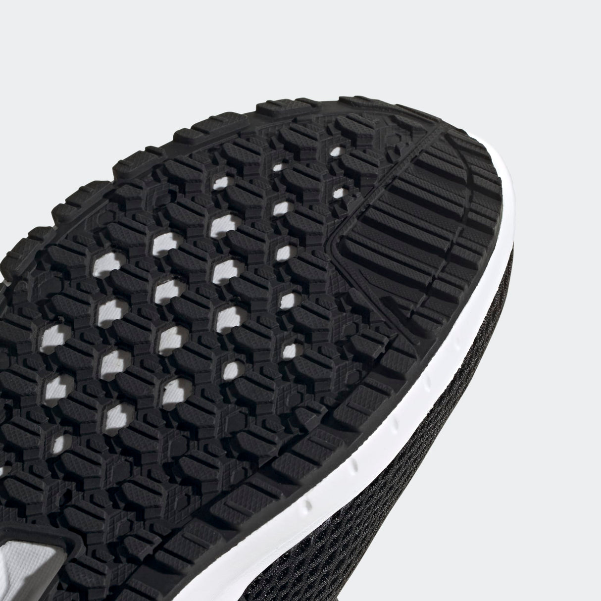 Adidas Ultimashow running shoe in black with a white midsole.