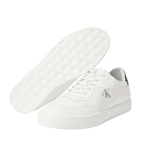 This is a pair of Calvin Klein Jeans Classic Cupsole Tech Ripstop men's sneakers in white with a black heel tab.