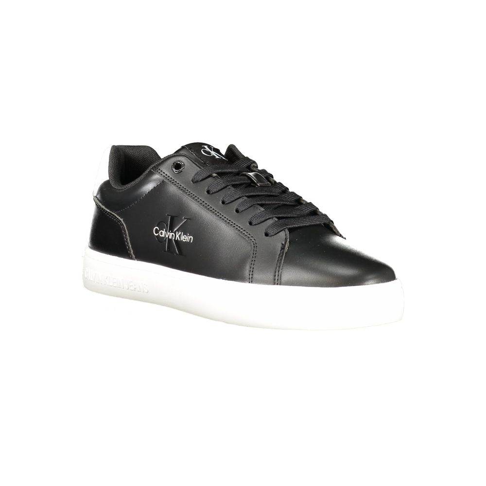 This is a pair of Calvin Klein Classic Cupsole Mono leather sneakers in black and white.
