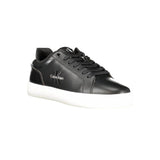 This is a pair of Calvin Klein Classic Cupsole Mono leather sneakers in black and white.
