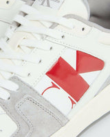 This is a pair of Calvin Klein Jeans Basket Cupsole Low sneakers in white and grey suede with red logo detail.