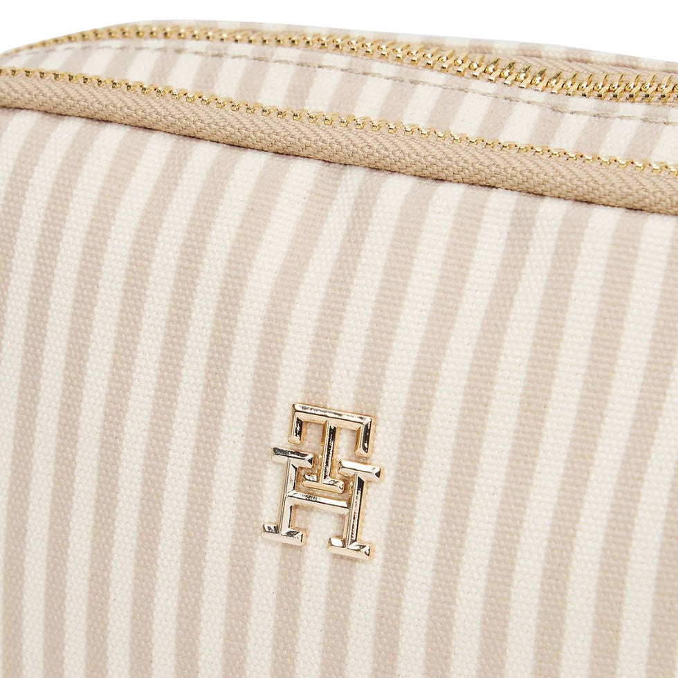 Tommy Hilfiger Poppy Summer Camera Bag in a striped design with a beige and off-white color scheme.