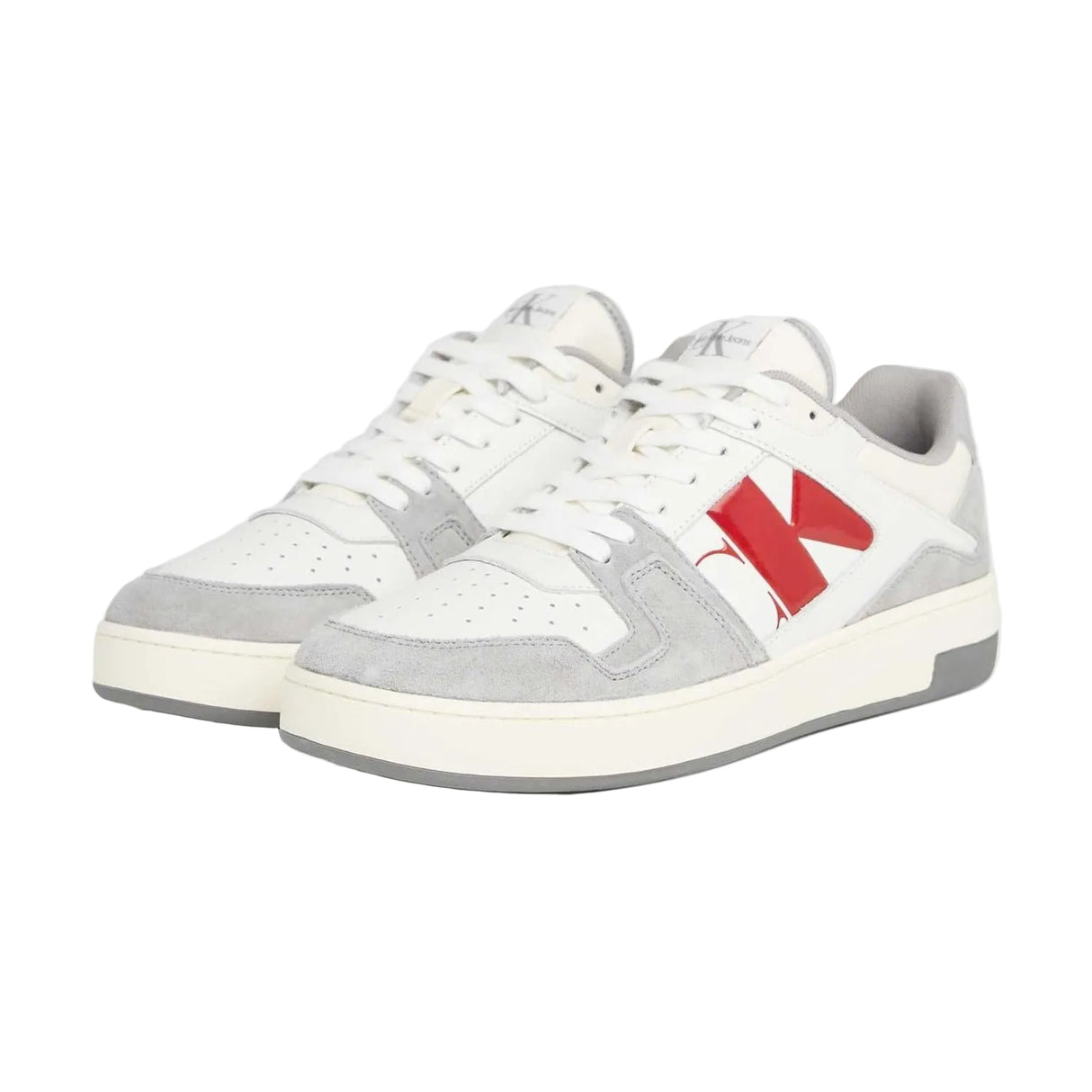 This is a pair of Calvin Klein Jeans Basket Cupsole Low sneakers in white and grey suede with red logo detail.