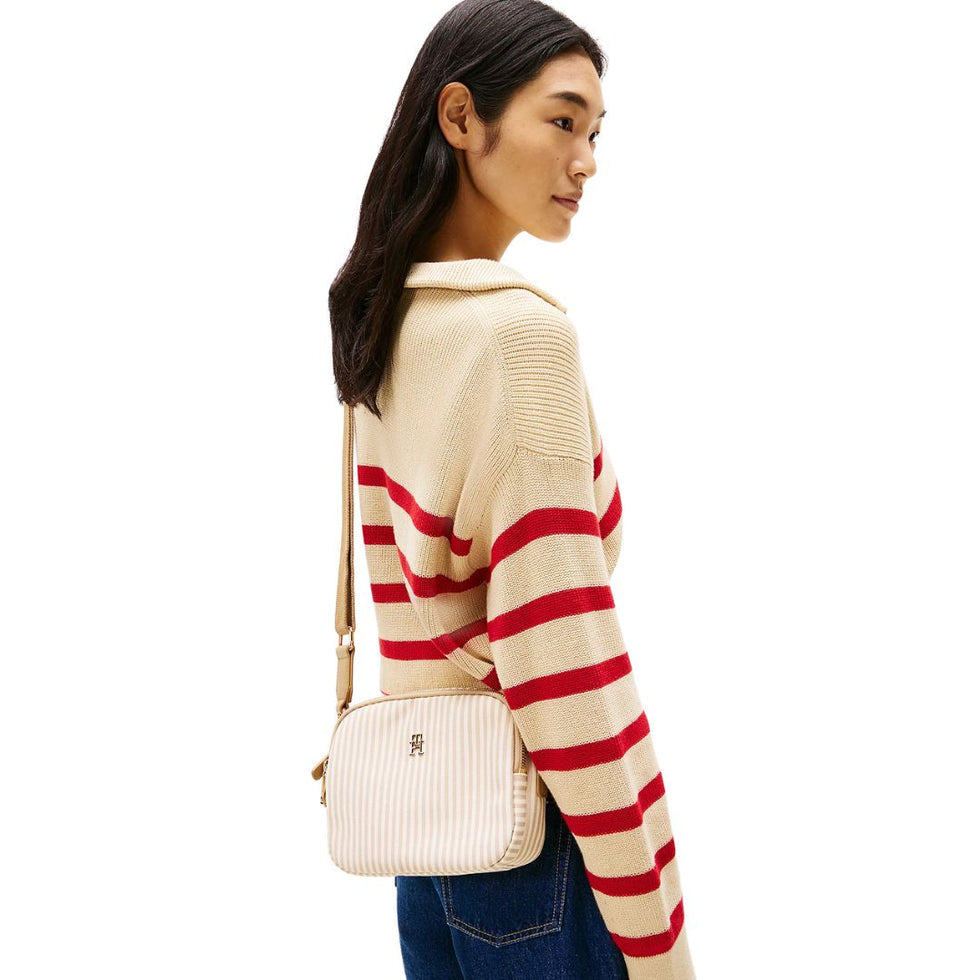 Tommy Hilfiger Poppy Summer Camera Bag in a striped design with a beige and off-white color scheme.
